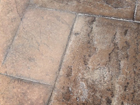 Sealer removal from stamped concrete